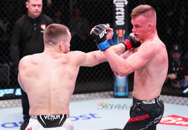 에이제이 커닝햄이 2024년 3월 미국 네바다주 엔터프라이즈 UFC on ESPN+ 96 라이트급 경기에서 맞고 있다. 사진=TKO