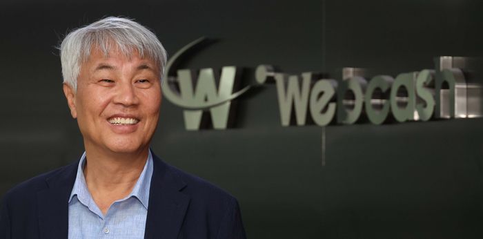 석창규 웹케시그룹 회장이 환하게 웃고 있다. [한주형 기자]