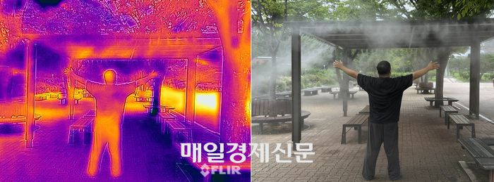 폭염경보가 내려진  7일 서울 영등포구 여의도광장 쿨링포그 아래에서 한 시민이 열기를 식히고 있다. . 사진 속 화상카메라에서 높은 온도는 노란색으로, 낮은 온도는 푸른색으로 표시된다.2025.07.04[이충우기자]