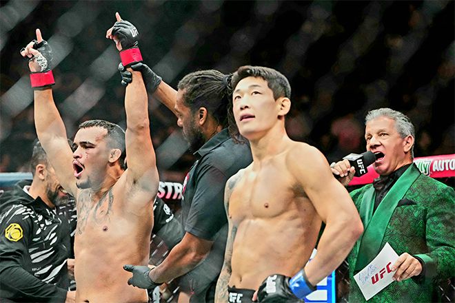 다니에우 구스타부 곤자가 산투스가 2025년 10월 미국 네바다주 패러다이스 티모바일 아레나 UFC 320 승리 선언을 들으며 감격하고 있다. 오른쪽은 UFC 데뷔 2연승 및 종합격투기 13연승 무산을 아쉬워하는 ‘좀비 주니어’ 유주상. 사진=Imagn Images=연합뉴스 제공
