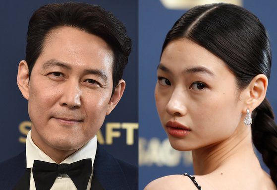 배우 이정재와 정호연이 27일(현지시간) 미국 로스앤젤레스(LA) 카운티 샌타모니카 바커행어 이벤트홀에서 열린 미국배우조합(SAG) 시상식에서 각각 남우주연상과 여우주연상을 수상했다. AP·EPA=연합뉴스