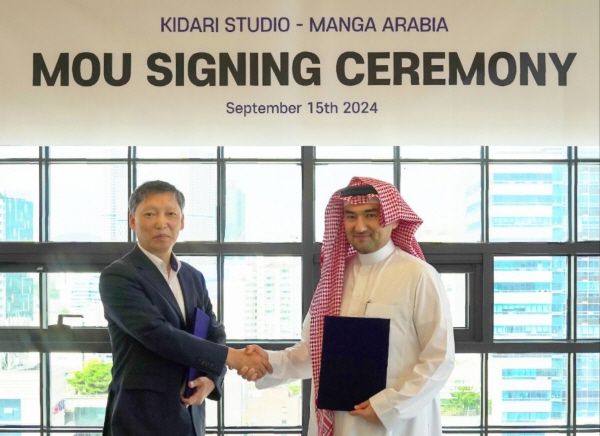 지난해 9월 15일 한국의 키다리 스튜디오 허흥범 대표와 사우디의 망가 아라비아 에삼 부카리 대표가 업무협약을 체결한 모습