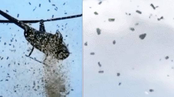 지난달 27일(현지시간) 미국 미시간주 디트로이트 상공에서 헬리콥터로 현금 수천 달러를 살포하는 장면. 사진 엑스 캡처