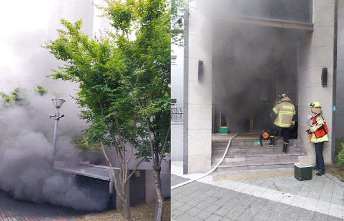 1일 오전 6시15분께 인천 서구 청라동 한 아파트 지하 1층 주차장에서 불이 나 검은 연기가 뿜어져 나오고 있다. (사진 = 인천소방본부 제공)