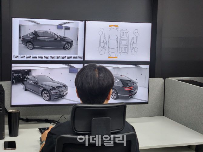 품질 분석관들이 입고된 중고차의 상태를 점검하고 있다. (사진=이배운 기자)