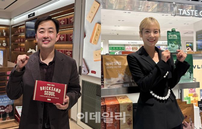 조헌기 브릭샌드 대표(왼쪽), 심으뜸 비브리브 대표가 18일 신세계면세점 명동점 11층에서 매장 오픈 기념사진을 촬영하고 있다. (사진=김지우 기자)