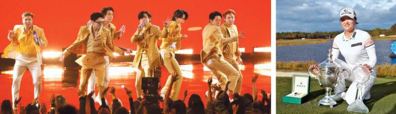 노래로 골프로 새 역사 쓴 BTS·고진영 - 미국 팝음악과 골프계가 2021년 최고의 영예를 한국에서 온 20대 청년들에게 바쳤다. 7명으로 구성된 ‘방탄소년단’이 21일(현지 시각) 그래미상과 함께 미 대중음악 양대 시상식 중 하나인 아메리칸뮤직어워즈(AMAs)에서 아시아인 최초로 대상 ‘아티스트 오브 더 이어’ 등 3부문에서 수상했다. 왼쪽 사진은 이들이 시상식에서 대상 수상곡 ‘버터’를 공연하는 모습. 미 여자 프로골프의 고진영은 이날 LPGA 투어 시즌 최종전 CME그룹 투어 챔피언십에서 우승하며 올해의 선수상과 함께 한국인 최초 3년 연속 상금왕의 대기록을 세웠다. /로이터·AFP 연합뉴스