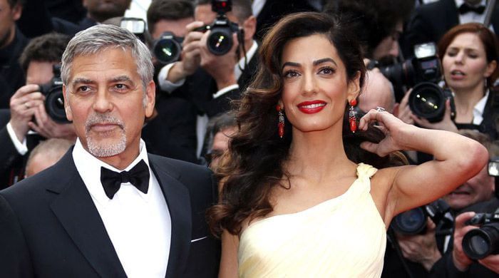 할리우드 배우인 조지 클루니(왼쪽)와 배우자인 국제 인권 변호사 아말 클루니. /로이터 뉴스1