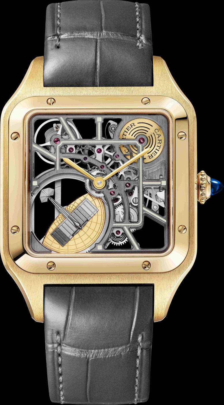 '산토스 뒤몽 마이크로 로터 스켈레톤 워치' 리미티드 에디션. 라지 모델, 오토매틱 메캐니컬 무브먼트 9629 MC. 옐로우 골드 케이스, 사파이어 카보숑 1개를 세팅한 옐로우 골드 비즈 크라운, 베이지 래커 장식 브리지, 세미-매트 다크 그레이 앨리게이터 가죽 스트랩. 까르띠에.