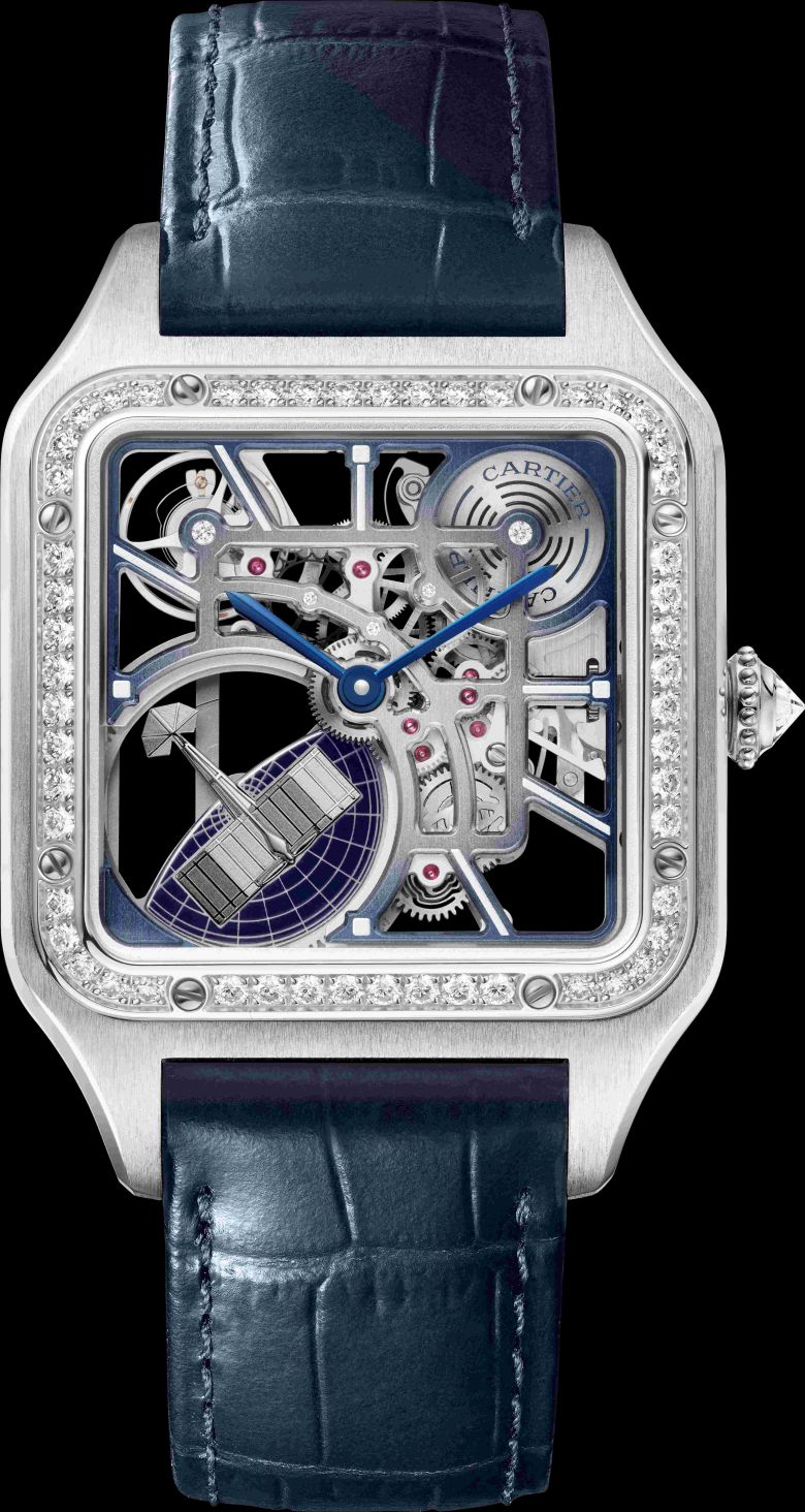 '산토스 뒤몽 마이크로 로터 스켈레톤 워치'. 라지 모델, 오토매틱 메캐니컬 무브먼트 9629 MC. 옐로우 골드 케이스, 사파이어 카보숑 1개를 세팅한 옐로우 골드 비즈 크라운, 베이지 래커 장식 브리지, 세미-매트 다크 그레이 앨리게이터 가죽 스트랩으로 디자인 됐다. 고유번호가 부여된 150피스 리미티드 에디션. 까르띠에.