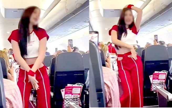 에어아시아의 한 승무원이 기내에서 춤을 추고 있다./틱톡