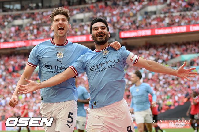 [사진] 존 스톤스(좌)와 일카이 귄도안(우) ⓒGettyimages(무단전재 및 재배포 금지)