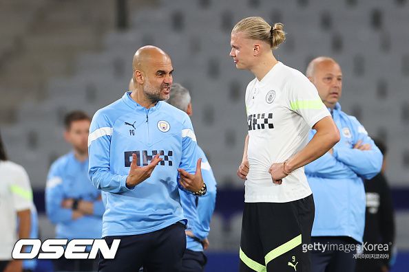 [사진] (왼쪽부터) 펩 과르디올라와 엘링 홀란 / ⓒGettyimages(무단전재 및 재배포 금지)
