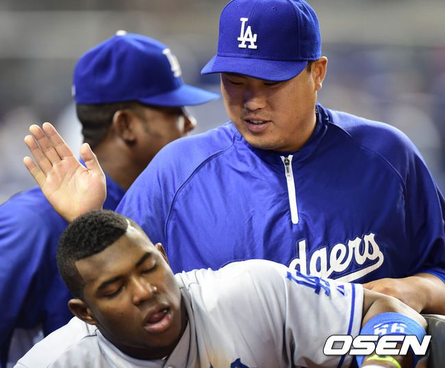 LA 다저스 시절 류현진과 야시엘 푸이그. /OSEN DB