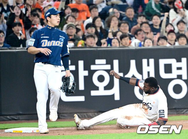 [OSEN=대전, 최규한 기자] 18일 오후 대전 한화생명 볼파크에서 ‘2025 신한 SOL Bank KBO리그’ 한화 이글스와 NC 다이노스의 경기가 열렸다.홈팀 한화는 엄상백, 방문팀 NC는 로건 앨런을 선발로 내세웠다.6회말 무사 1루 상황 한화 문현빈 타석 때 주자 플로리얼이 2루 도루에 이어 상대 실책을 틈타 3루까지 내달려 세이프되고 있다. 2025.04.18 / dreamer@osen.co.kr