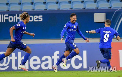 결승골을 터트린 얼 힐랄 하탄 바헤브리(가운데)가 환호하는 모습.[신화=연합뉴스]