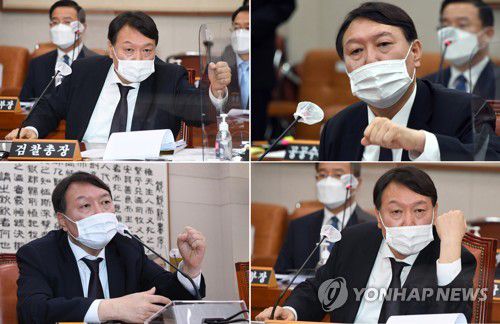 답변하는 윤석열 검찰총장(서울=연합뉴스) 하사헌 기자 = 윤석열 검찰총장이 22일 국회에서 열린 법제사법위원회 대검찰청 국정감사에서 다양한 표정으로 답변하고 있다. 2020.10.22 toadboy@yna.co.kr