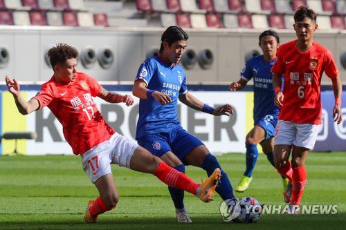 수원과 광저우의 경기 모습[AFP=연합뉴스]