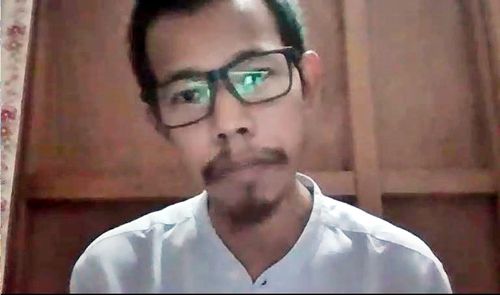 연합뉴스와 화상 인터뷰를 진행 중인 타이자 신.2021.4.14[방콕=연합뉴스 김남권 특파원]