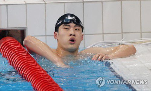 [올림픽] 200m 자유형 결승서 7위 기록한 황선우(도쿄=연합뉴스) 김인철 기자 = 27일 일본 도쿄 아쿠아틱스센터에서 열린 도쿄 올림픽 수영 남자 자유형 200m 결승전에서 황선우가 아쉬워하고 있다.     황선우는 1분45초26의 기록으로 8명 중 7위를 기록했다. 2021.7.27 yatoya@yna.co.kr