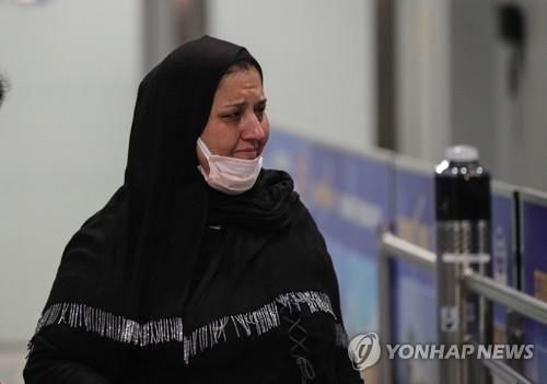 독일군 수송기로 카불 공항을 탈출해 독일 공항에 처음 도착한 아프간인들 [AFP=연합뉴스]