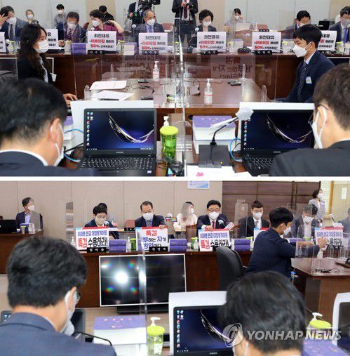 대장동 의혹 놓고 여야간 기싸움(세종=연합뉴스) 김주형 기자 = 5일 오전 정부세종청사에서 열린 국회 환경노동위원회의 환경부에 대한 국정감사에 앞서 더불어민주당 의원들(위쪽)과 국민의힘 의원들이 대장동 의혹 관련 팻말을 놓고 의사발언을 하고 있다.     더불어민주당 의원들은 '화천대유=아빠의힘 게이트, 50억이 산재위금?' 팻말을, 국민의힘 의원들은 '이재명 판교 대장동게이트 특검 수용하라' 팻말을 붙이고 있다. 2021.10.5 [공동취재] kjhpress@yna.co.kr