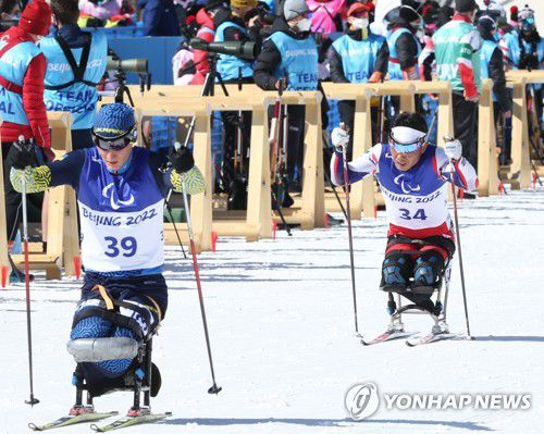 [패럴림픽] '마지막까지'(서울=연합뉴스) 신의현이 8일 중국 장자커우 국립바이애슬론센터에서 열린 2022 베이징 동계패럴림픽 바이애슬론 미들 좌식 3차시기에서 질주하고 있다. 신의현은 이날 11위를 차지했다. 2022.3.8 [대한장애인체육회 제공. 재판매 및 DB금지] photo@yna.co.kr
