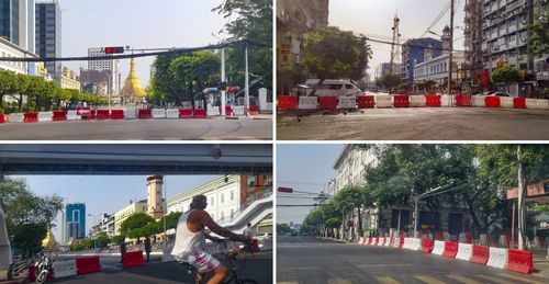 양곤 시청 앞으로 향하는 도로를 전면 봉쇄한 미얀마 군경. 2022.4.13.[양곤=연합뉴스] 이정호 통신원