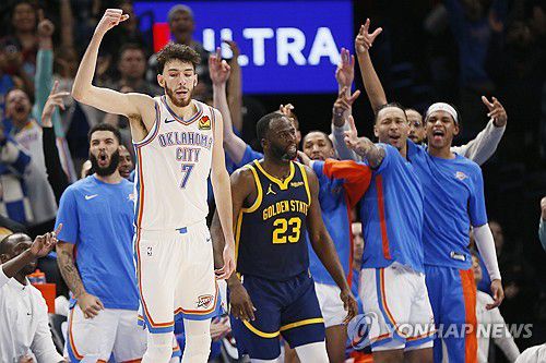 희비가 갈린 쳇 홈그렌과 드레이먼드 그린[AP=연합뉴스]