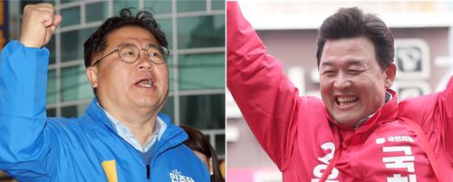 경남 양산갑 민주 이재영·국힘 윤영석 후보 (양산=연합뉴스) 최병길, 김동민 기자 = 경남 양산갑 더불어민주당 이재영 후보(왼쪽)와 국민의힘 윤영석 후보가 유권자들을 대상으로 선거운동을 펼치고 있다. 2024.3.31 choi21@yna.co.kr