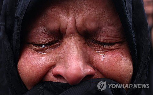 발리아스르 광장에서 라이시 대통령 사망에 슬퍼하는 테헤란 시민[AFP=연합뉴스 자료사진. 재판매 및 DB 금지]