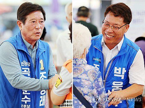 곡성군수 재선거 출마한 후보자들(곡성=연합뉴스) 정다움 기자 = 13일 오전 전남 곡성기차마을전통시장에서 10·16 곡성군수 재선거에 출마한 더불어민주당 조상래 후보(왼쪽)와 조국혁신당 박웅두 후보(오른쪽)가 상인들과 인사하고 있다. 2024.9.13 daum@yna.co.kr