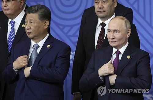 시진핑 중국 국가주석(좌)와 블라디미르 푸틴 러시아 대통령[EPA=연합뉴스 자료사진. 재판매 및 DB 금지]