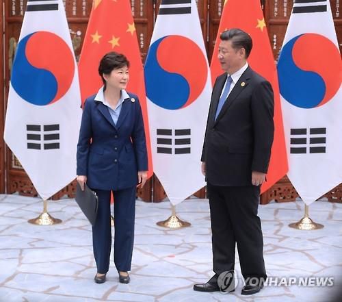 박근혜 전 대통령(왼쪽)과 시진핑 중국 국가주석.[연합뉴스 자료사진. 재판매 및 DB 금지]