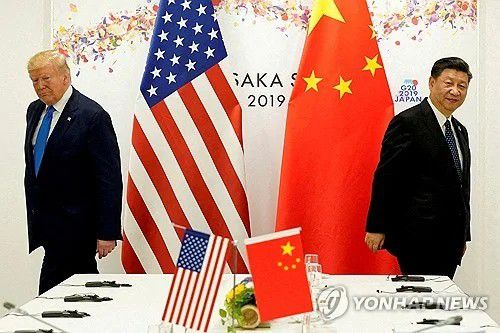 2019년 6월 일본 오사카에서 열린 G20 정상회의를 계기로 만난 트럼프와 시진핑.[로이터 연합뉴스 자료사진. 재판매 및 DB 금지]