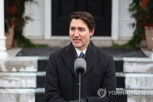 사임 발표하는 쥐스탱 트뤼도 전 캐나다 총리[AFP 연합뉴스 자료사진. 재판매 및 DB 금지]