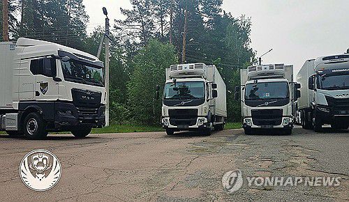 전사자 시신 실은 냉동트럭[AFP/우크라이나 전쟁포로 처리 조정본부 제공 자료사진. 재판매 및 DB 금지]
