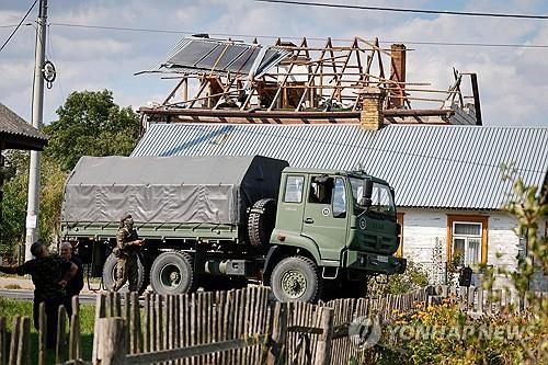 10일 폴란드 동부에서 격추된 러시아 드론 수색 현장[AFP=연합뉴스 자료사진]