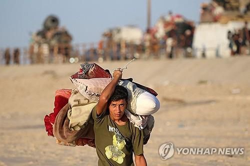 이스라엘 공세 재개에 남쪽으로 피란하는 가자지구 주민[AFP 연합뉴스 자료사진. 재판매 및 DB 금지]