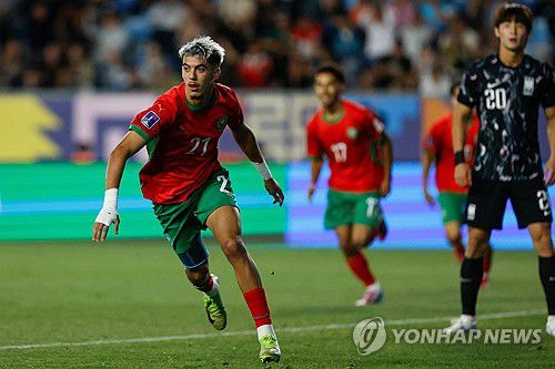 신민하의 자책골에 기뻐하는 모로코의 야시르 자비리[AFP=연합뉴스]