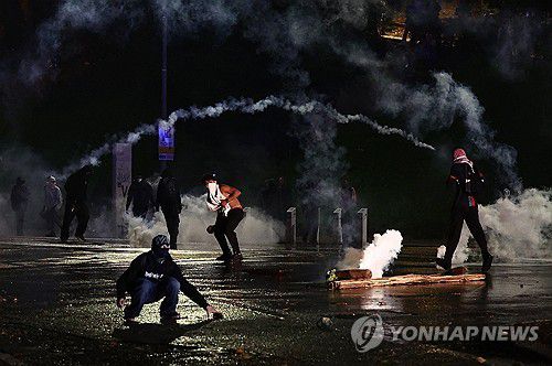 이스라엘 출전에 반대하는 친팔레스타인 시위대[로이터 연합뉴스. 재판매 및 DB 금지]