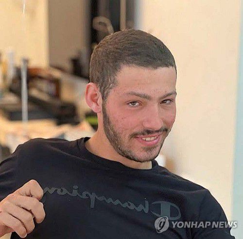 시신으로 이스라엘에 돌아온 인질 사망자 이타이 첸[이스라엘 인질·실종자가족 포럼 제공/AP=연합뉴스. 재판매 및 DB 금지]