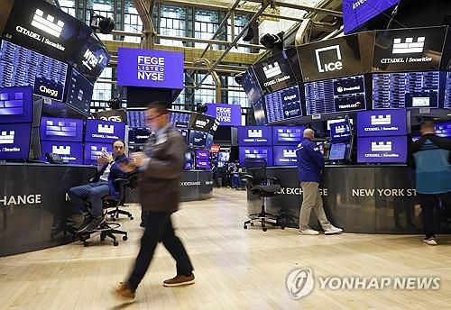 뉴욕증권거래소의 트레이터[UPI 연합뉴스 자료사진. 재판매 및 DB 금지]