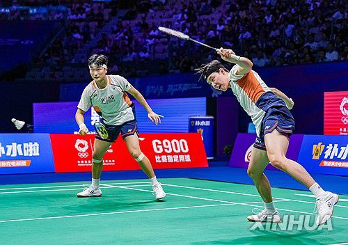 좌측부터 김원호·서승재[신화통신=연합뉴스]