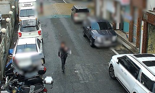 범행 후 양복으로 환복한 피의자[경기남부경찰청 제공. 재판매 및 DB 금지]