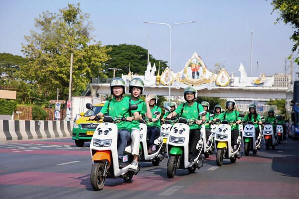 A fleet of LUYUAN electric scooters, ridden by Chinese and Thai youth, took to the streets of Bangkok