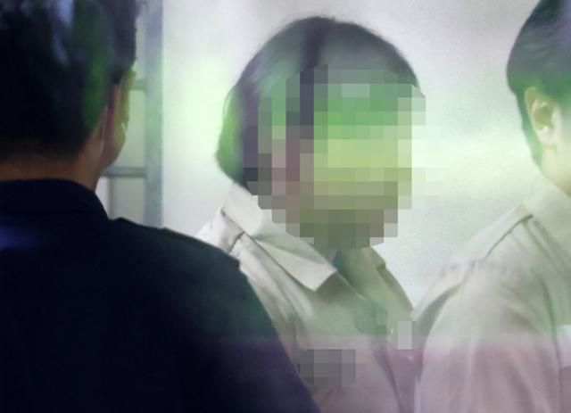 2023년 6월 부산고법에서 20년형을 선고받은 뒤 호송차에 오르고 있는 돌려차기 사건 가해자. 연합뉴스