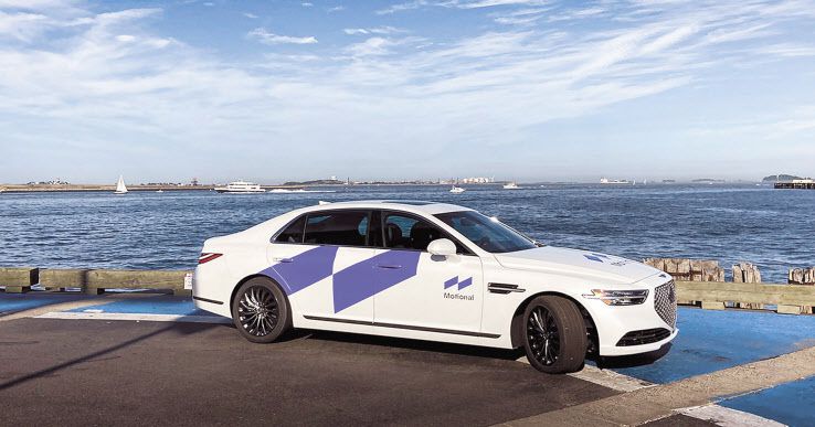 ‘모셔널’은 현대차그룹과의 파트너십을 상징하는 의미를 담아 모셔널 브랜드를 래핑한 제네시스 G90을 12일 공개했다. [현대차그룹 제공]