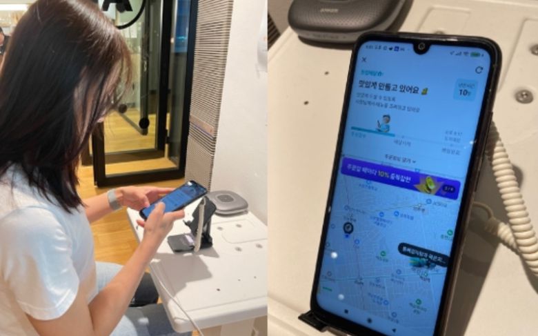 공용 스마트폰으로 배달음식을 주문하는 모습. [엔라이즈 제공]