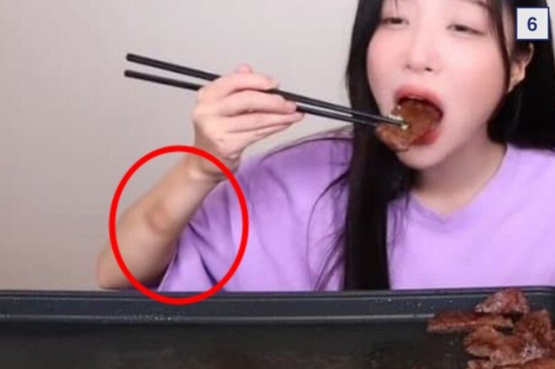 먹방 유튜버 쯔양의 과거 영상 속에서 확인된 팔의 상처들. [온라인 커뮤니티 캡처]